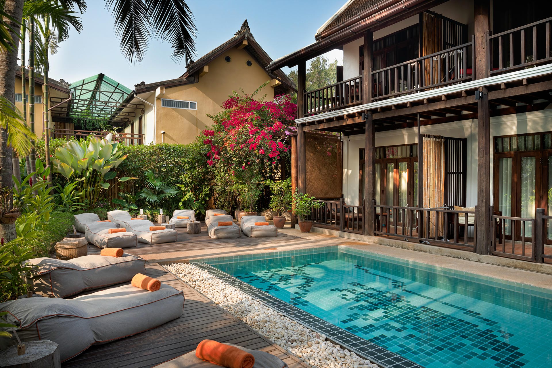 Poolside resting area at Maison Dalabua